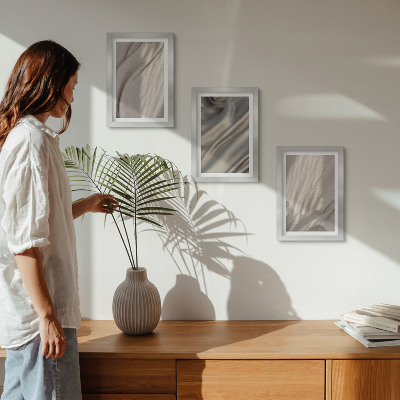 Conjunto de 3 quadros decorativos Detalhe das estruturas de tecido natural em estilo boho.