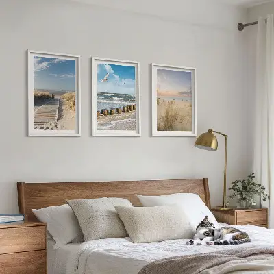 Conjunto de quadros para sala de estar com tema de praia, areia, ondas, céu e pássaros