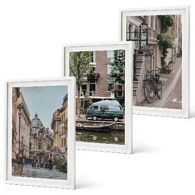 Conjunto de quadros para sala de estar com vistas da cidade e edifícios