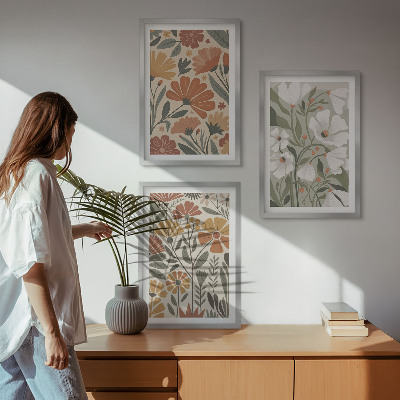 Composição de quadros moderna Estampas florais em tons de laranja e verde.