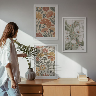 Composição de quadros moderna Estampas florais em tons de laranja e verde.