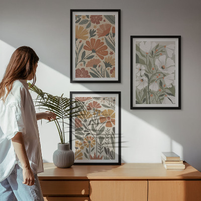 Composição de quadros moderna Estampas florais em tons de laranja e verde.