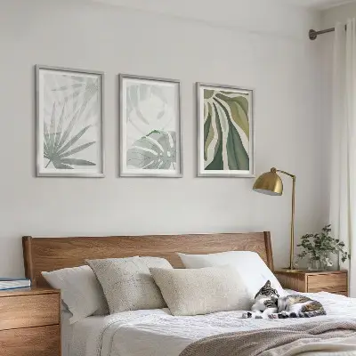 Conjunto de quadros para sala de estar com estampas de folhas de plantas em tons de verde e cinza