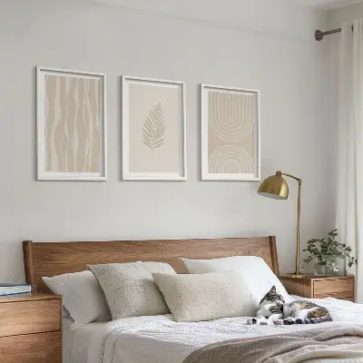 Composição de quadros moderna com padrões de plantas em tons bege