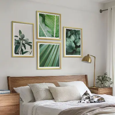 Conjunto de 4 quadros com moldura estampa de folhas tropicais em verde