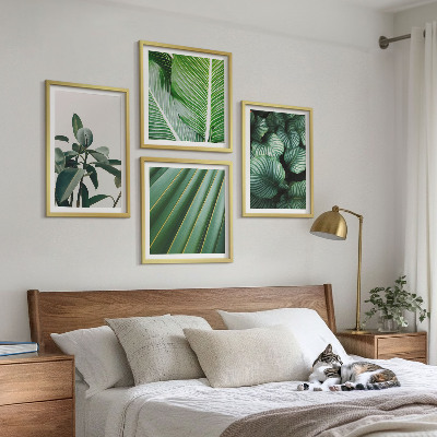 Conjunto de 4 quadros com moldura Folhas tropicais em verde