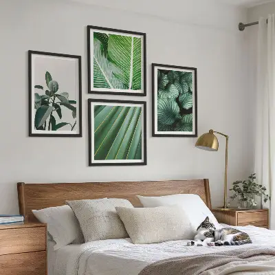 Conjunto de 4 quadros com moldura estampa de folhas tropicais em verde