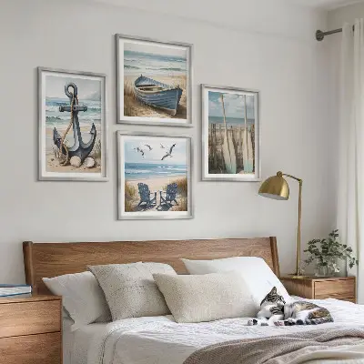 Composição de quadros com tema de âncora barco e remos na praia