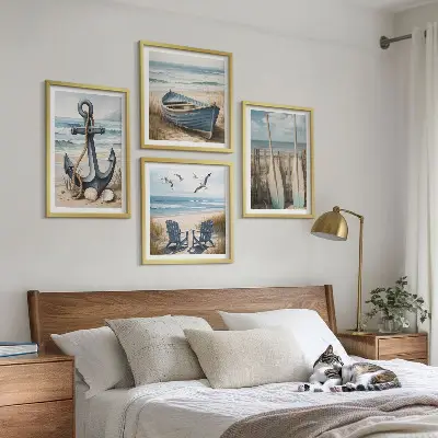 Composição de quadros com tema de âncora barco e remos na praia