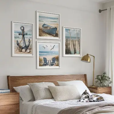 Composição de quadros com tema de âncora barco e remos na praia