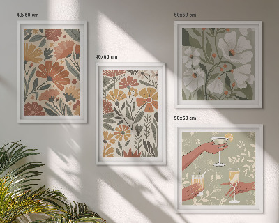 Composição de quadros Estampas florais em tons de laranja e verde.