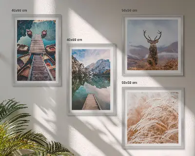 Conjunto de 4 quadros com moldura com temática de barcos no lago, veados e montanhas
