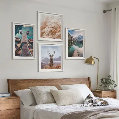 Conjunto de 4 quadros com moldura com temática de barcos no lago, veados e montanhas