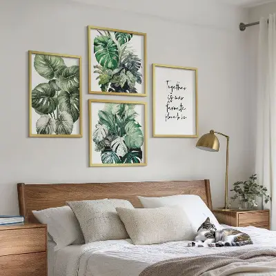 Composição de quadros decorativa com folhas tropicais verdes