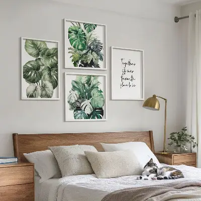 Composição de quadros decorativa com folhas tropicais verdes