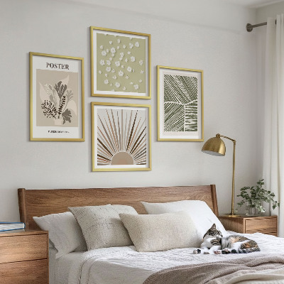 Composição de quadros Motivos vegetais em cores suaves.