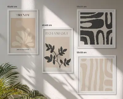 Composição de quadros com estampas florais elegantes em tons de bege e preto