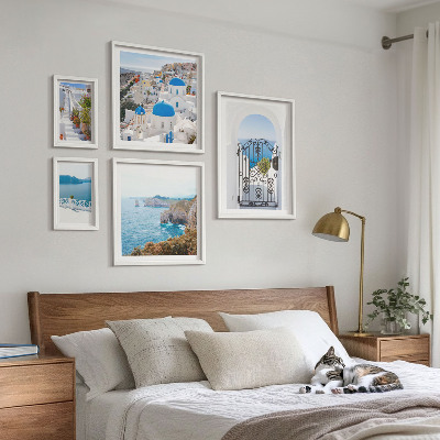 Conjunto de 5 quadros com moldura Casas de Santorini à beira-mar azul